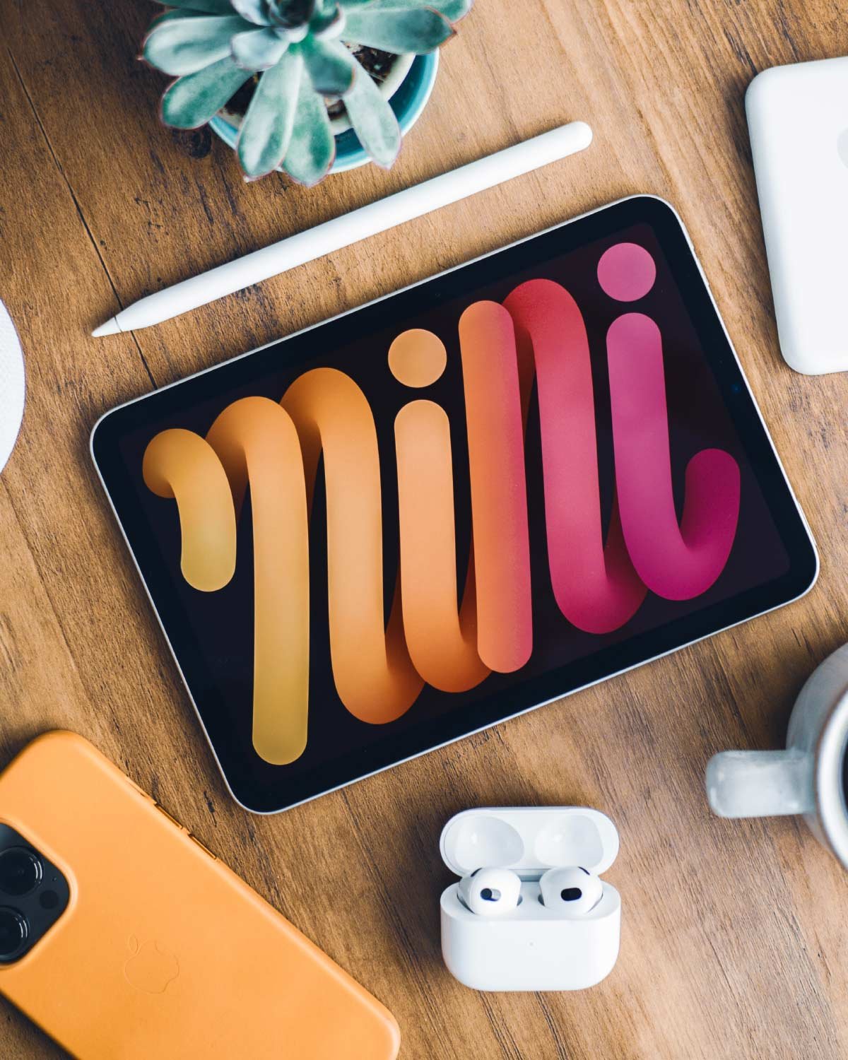 iPad displaying colorful text design.