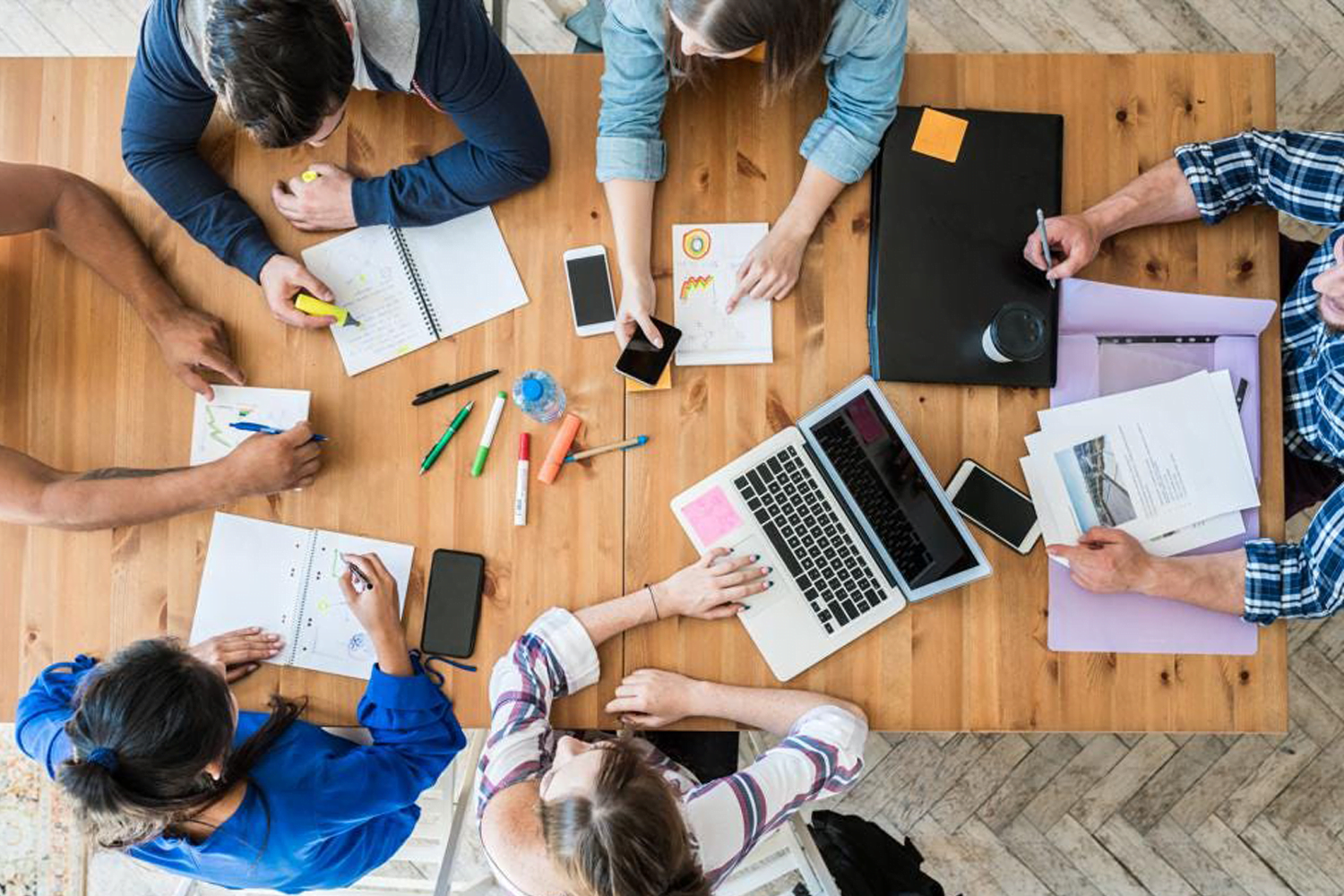 Team brainstorming, collaborative work session.